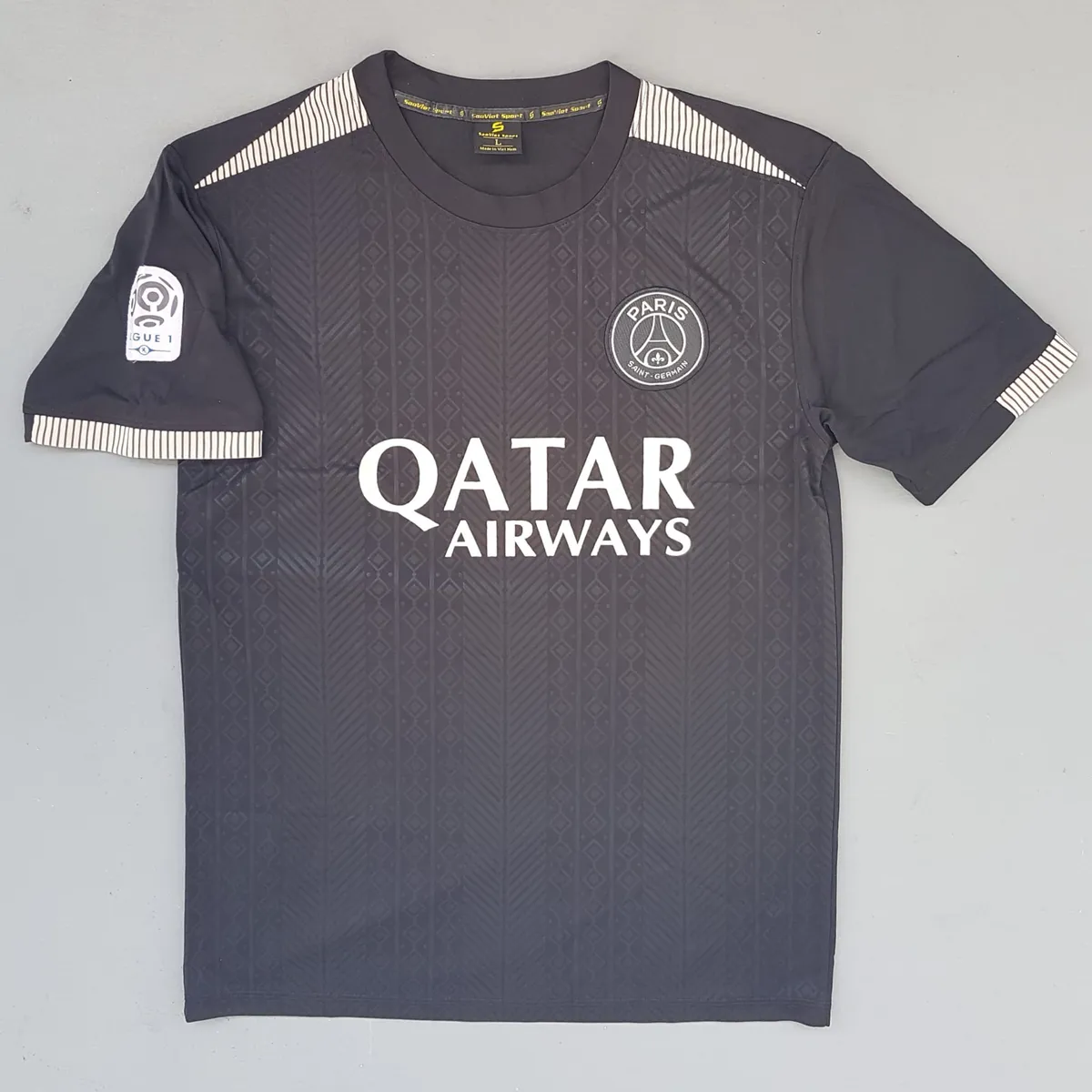 PSG Exclusive Paris Saint-Germain Jersey, Original PSG Top, Black Shirt, Cosmopolitan, French Football Club, Lique 1, QATAR Airways, Authentic Licensed Football Merchandise, Sophistication, Pop Culture, Urban Style, Timeless Appeal, Cult Street Fashion