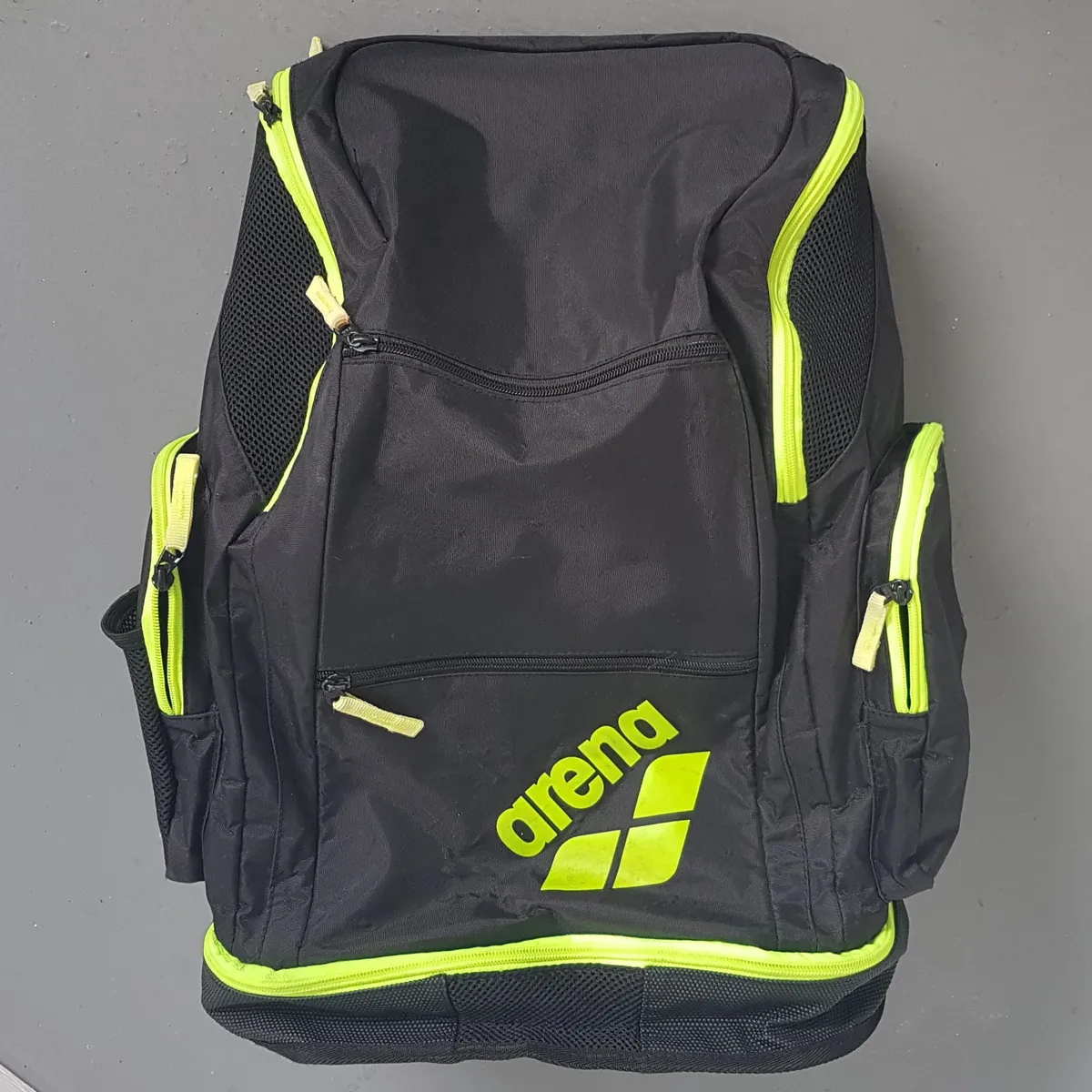 ARENA Original Arena Spiky 2 Large Fluro Yellow Backpack, 40 Liter Haversack, Travel Pack, Cosmopolitan, Sleek Designer Bag, U-Shaped Top Opening, Extra Bottom Compartment, Padded Straps, Sophistication, Pop Culture, Urban Style, Timeless Appeal, Everyday Bag