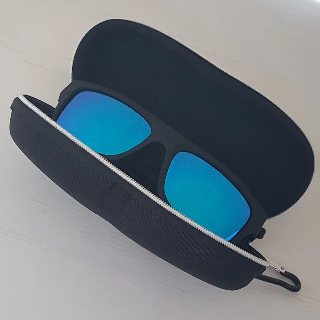 Johnson & Johnson Vision Sunglasses, Polarized Blue Mirrored Lenses, UV Protection, Cosmopolitan, Sunshades, Sleek Designer Shades, Professional Eyewear, Safety Glasses, Cool Looking Goggles, Sophistication, Streetwise, Pop Culture, Everyday Fashion
