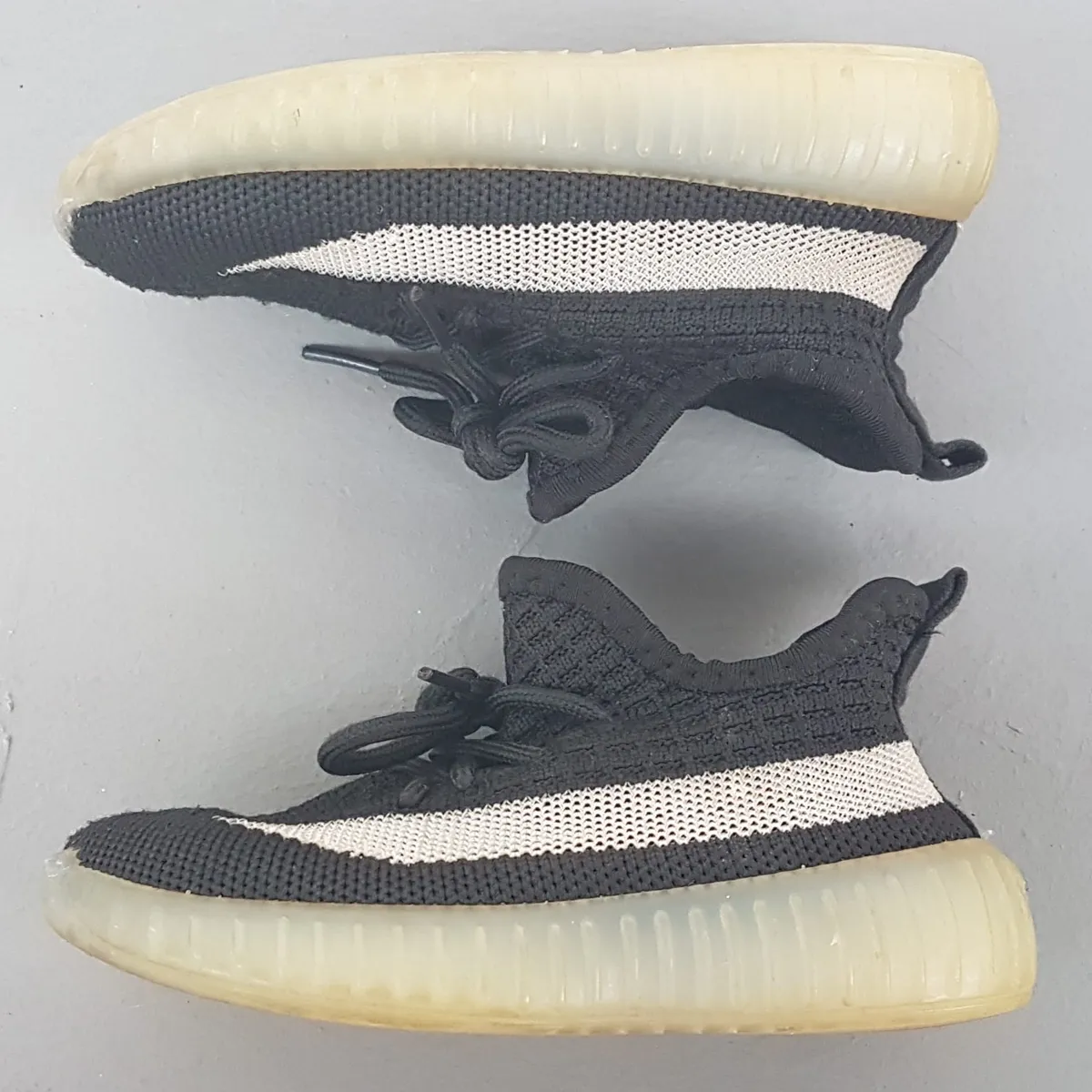 Adidas Kid’s Designer Shoes, YEEZY Boost 350 V2 Sneakers, Size EU 25, 2 to 3 Years Old, Cosmopolitan, Black Prime Knit, Cream Side Stripe, Toddler Walking Shoes, Pop Culture, Sophistication, Streetwise, Everyday Fashion