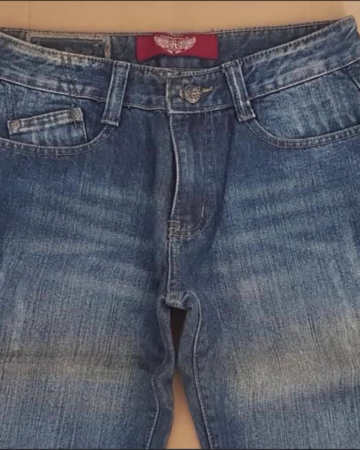 Edgy Denim Jeans with Skull Patch and Stud Details - Photo 2