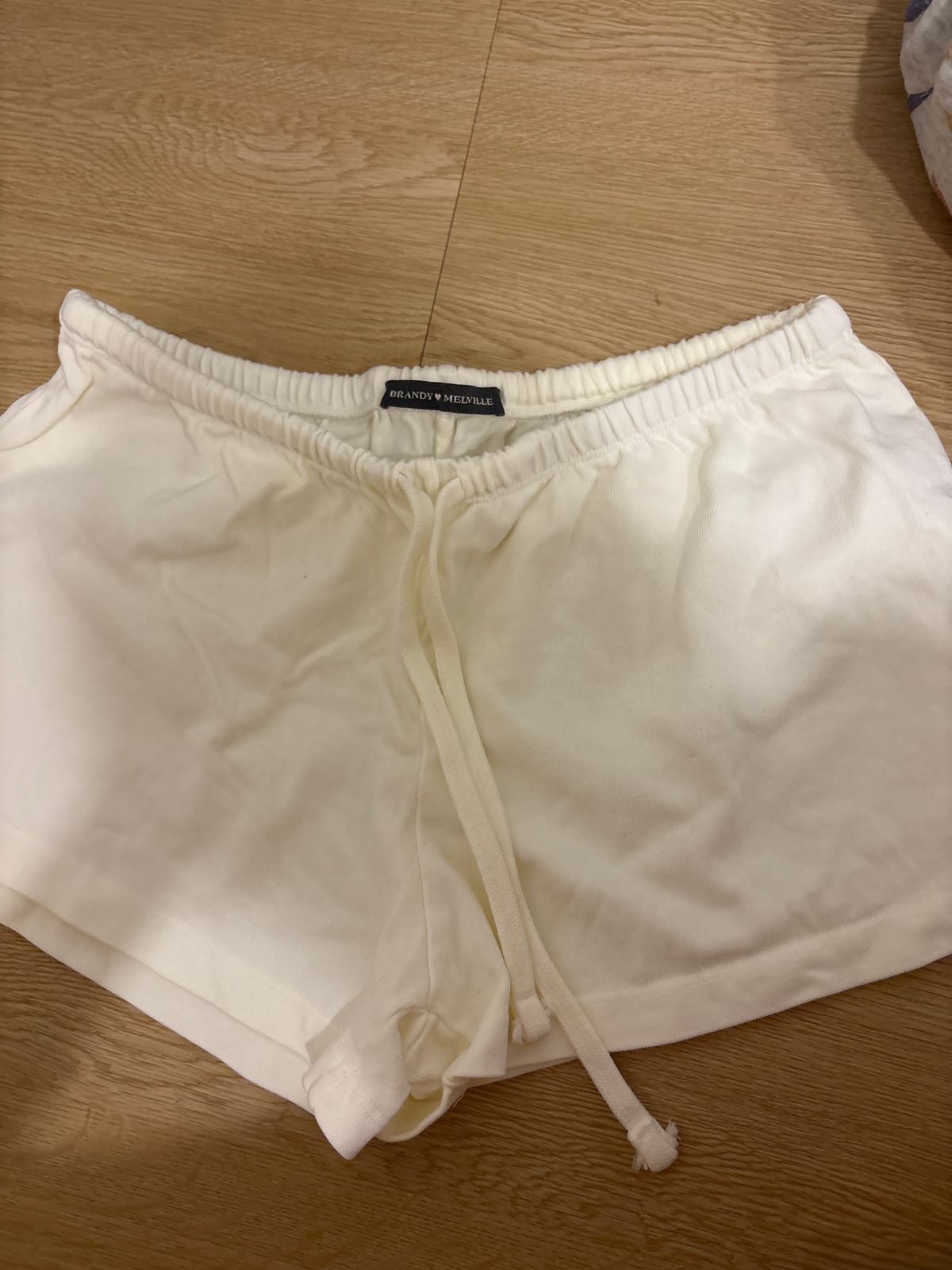 Chill Cream Terry Shorts by Brandy Melville