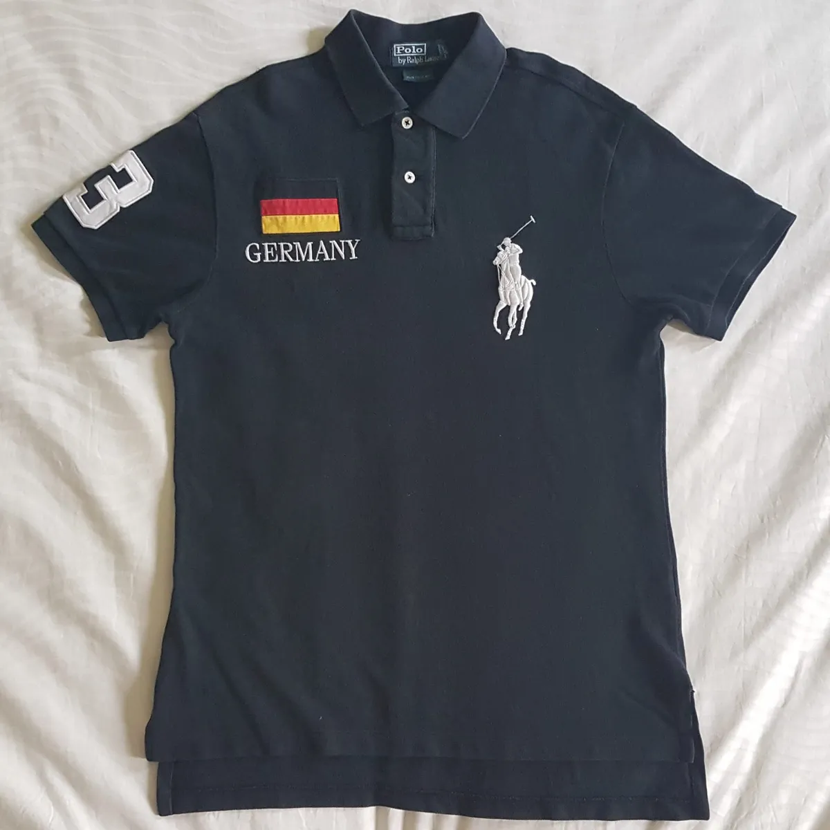 Ralph Lauren Luxury Polo Shirt by Ralph Lauren, Retro GERMANY Flag Number 3 Model, MEDIUM 2 Buttons Top, Black Shirt, Big White RL Polo Logo, Custom Fit, All American, Summer Holidays, Urban Style, Sophistication, Pop Culture, Rock Star, Everyday Fashion - Photo 2