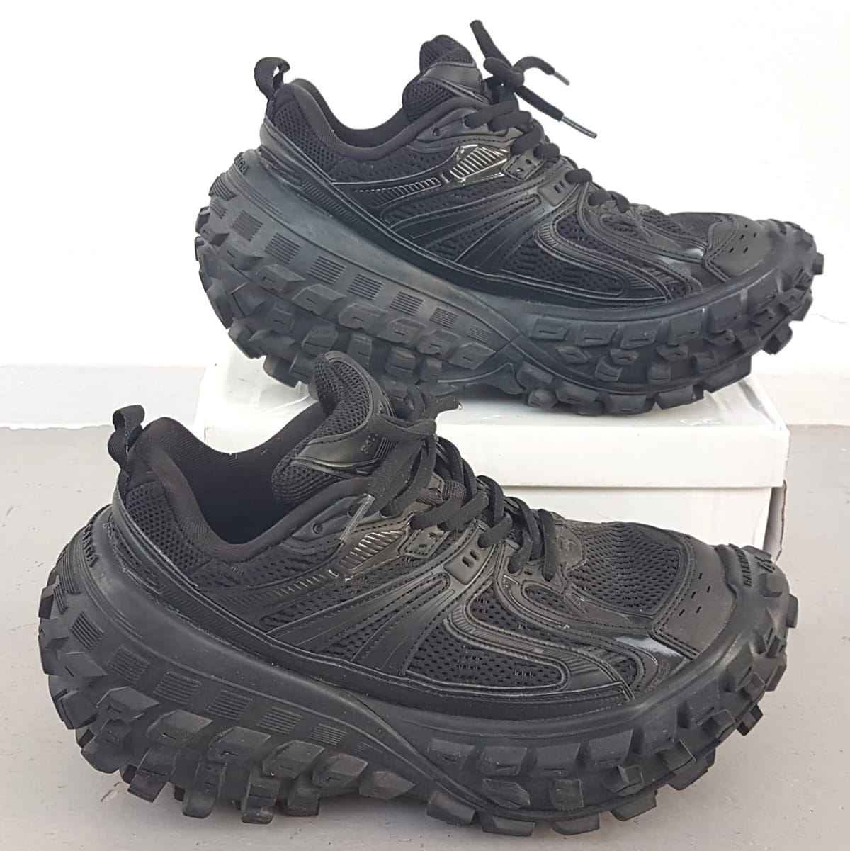 Rare Balenciaga Defender Shoes, Bouncer Black Mesh Sneakers, Size EU 41, US 8, UK 7, Ivory Glow Model, Cosmopolitan, Cool Black Trainers, Sleek Designer Fashion, Eye-Catching, Streetwise, Sophistication, Roadster, Pop Culture, Luxury Living, Urban Style