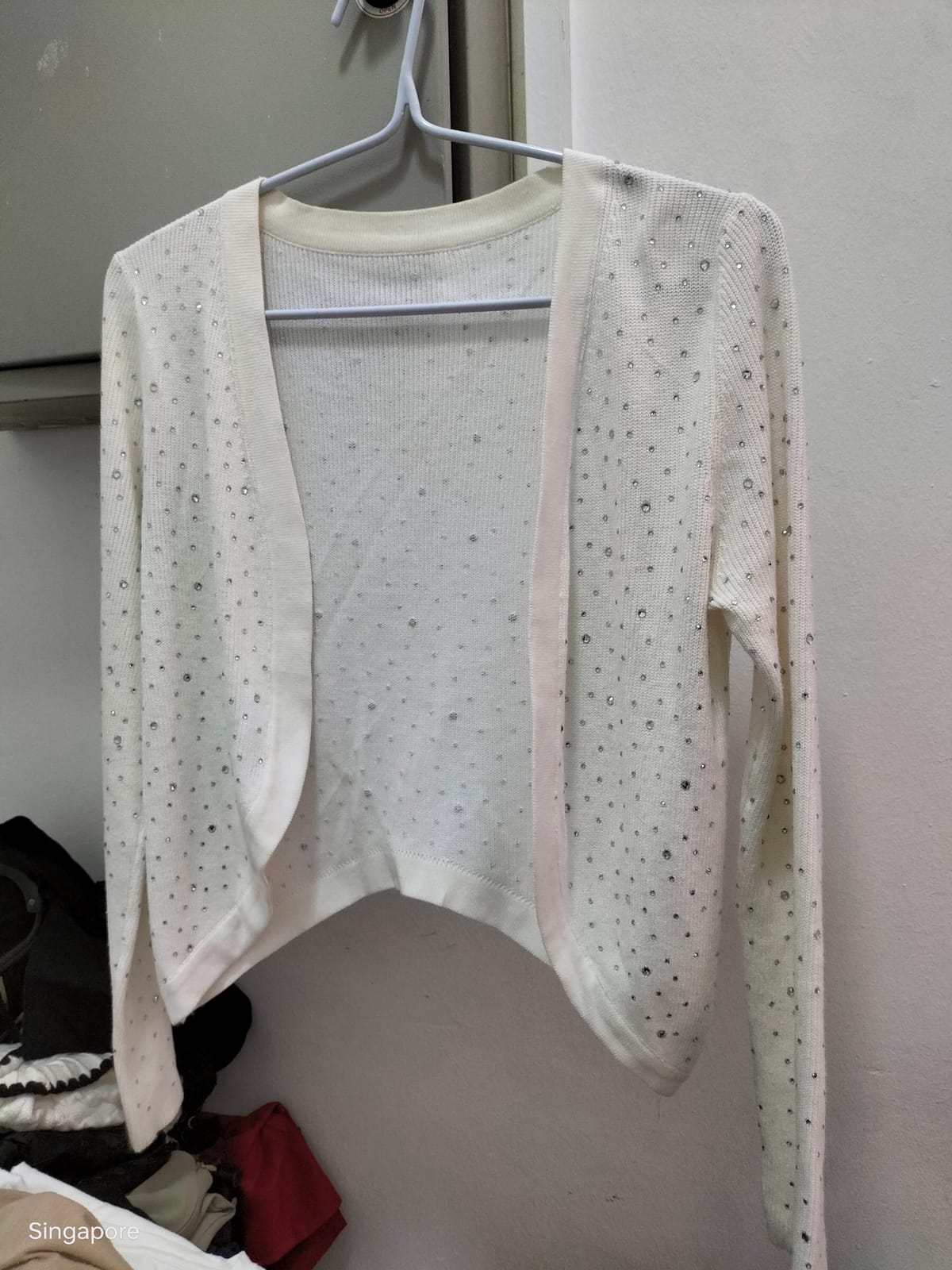 Elegant White Knit Sweater with Crystal Details