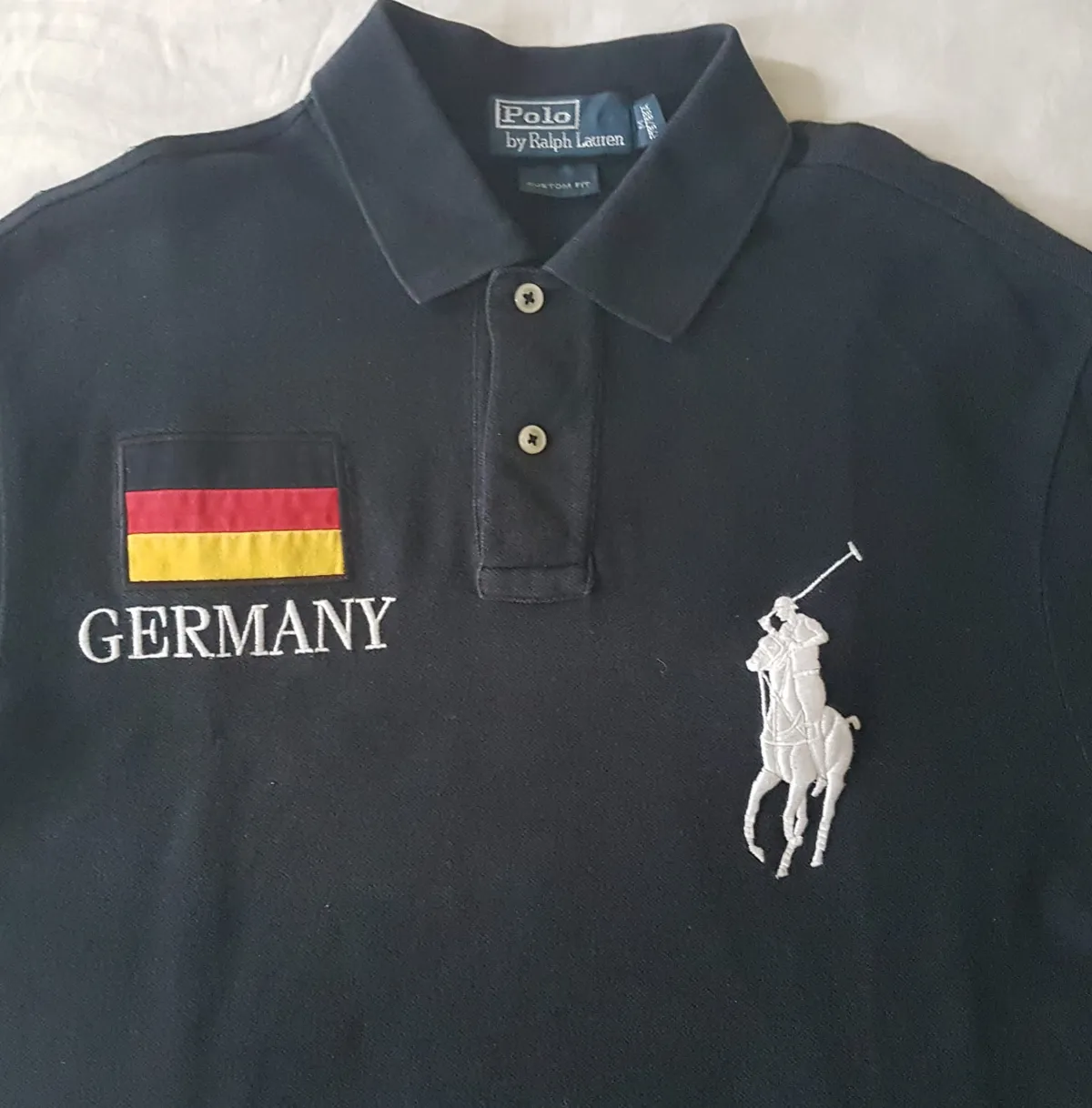 Ralph Lauren Luxury Polo Shirt by Ralph Lauren, Retro GERMANY Flag Number 3 Model, MEDIUM 2 Buttons Top, Black Shirt, Big White RL Polo Logo, Custom Fit, All American, Summer Holidays, Urban Style, Sophistication, Pop Culture, Rock Star, Everyday Fashion - Photo 3