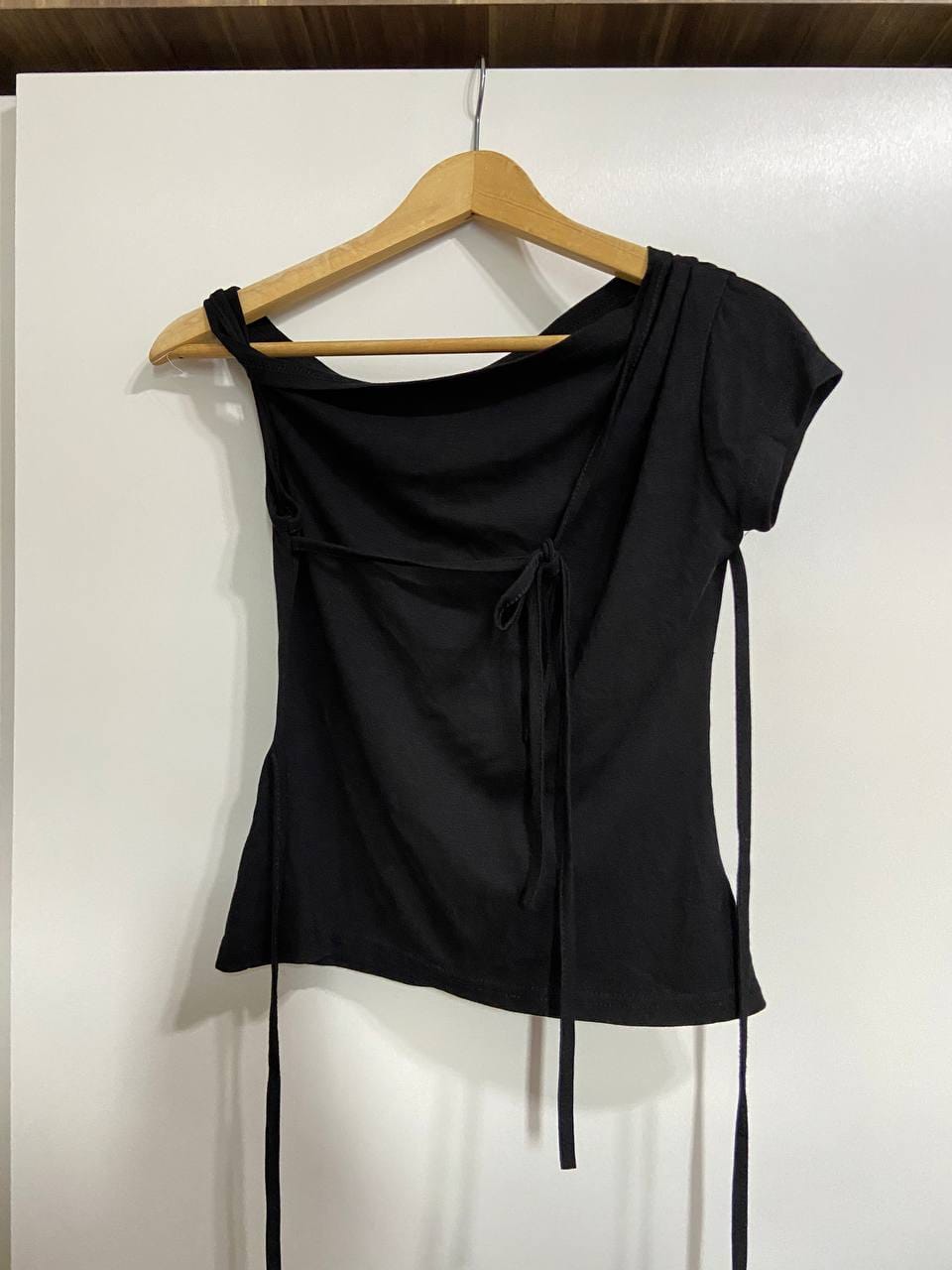 black asymmetrical tie top