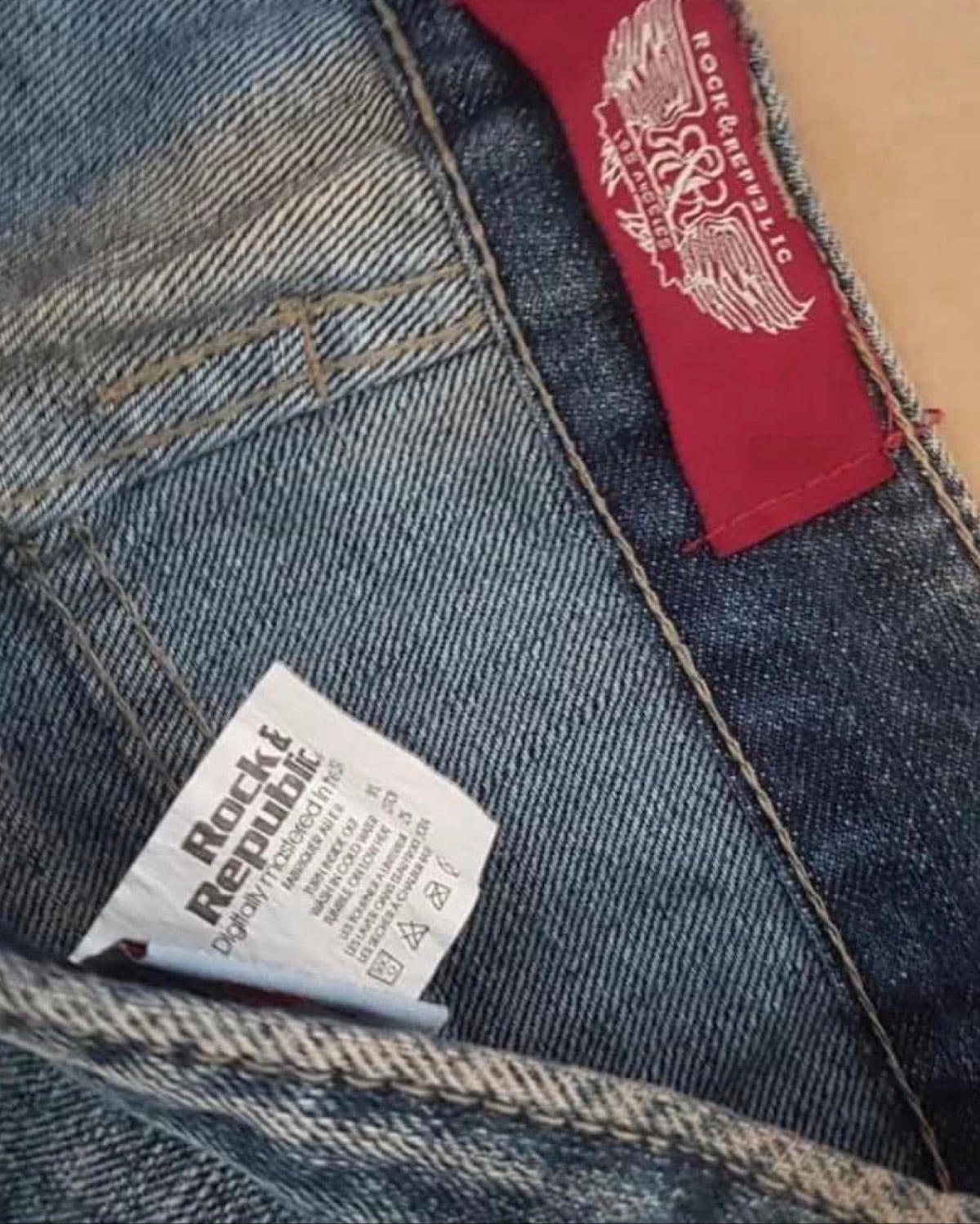 Edgy Denim Jeans with Skull Patch and Stud Details - Photo 3