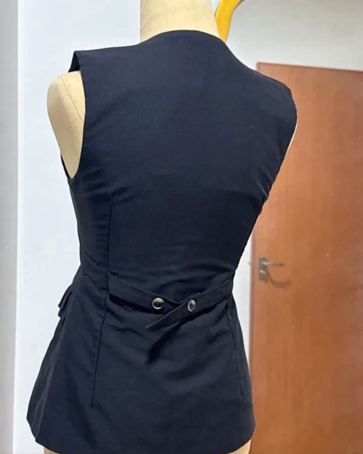 Black Button-Up Sleeveless Waistcoat with Peplum Detail - Photo 2