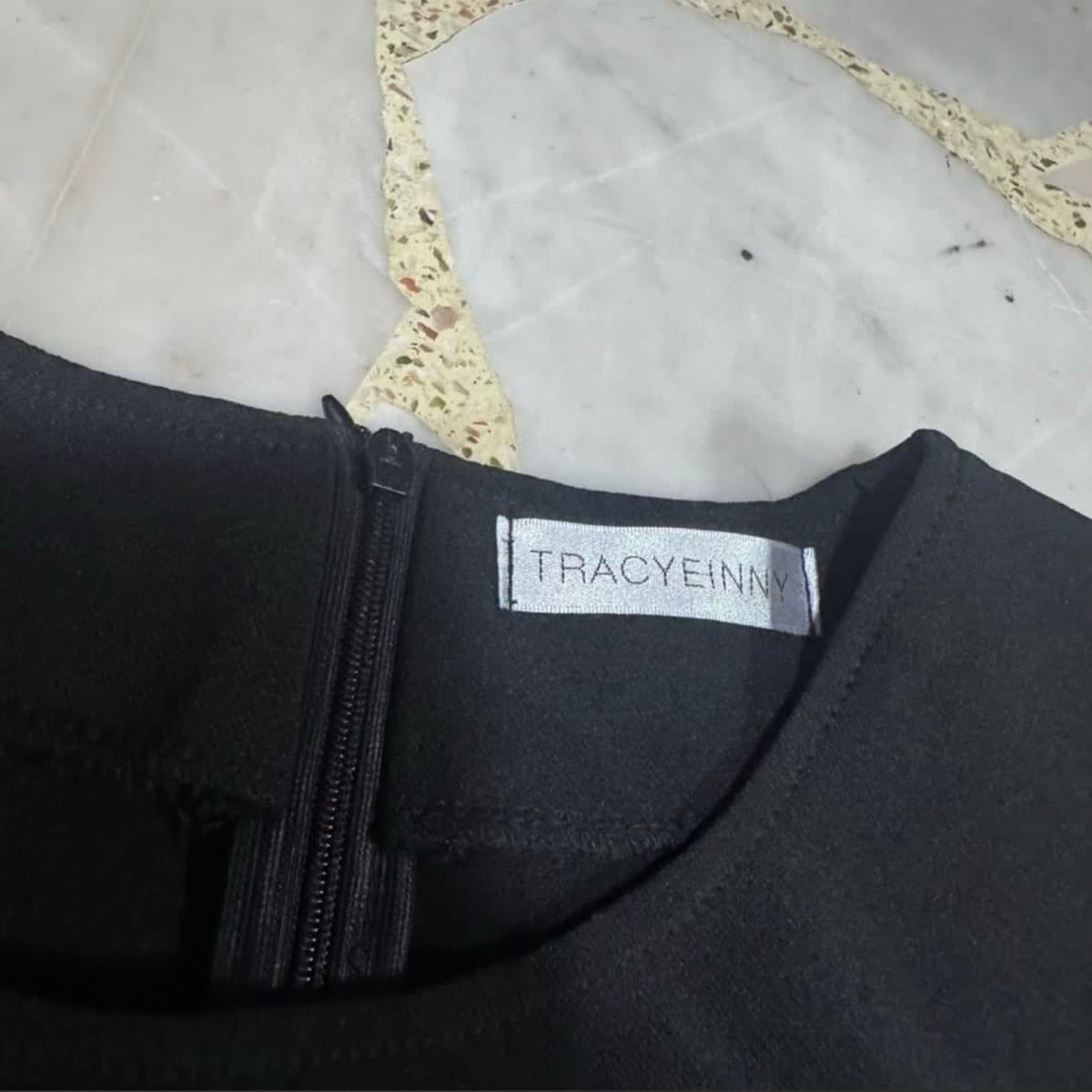 Chic Black Flowy Mini Dress - Photo 3