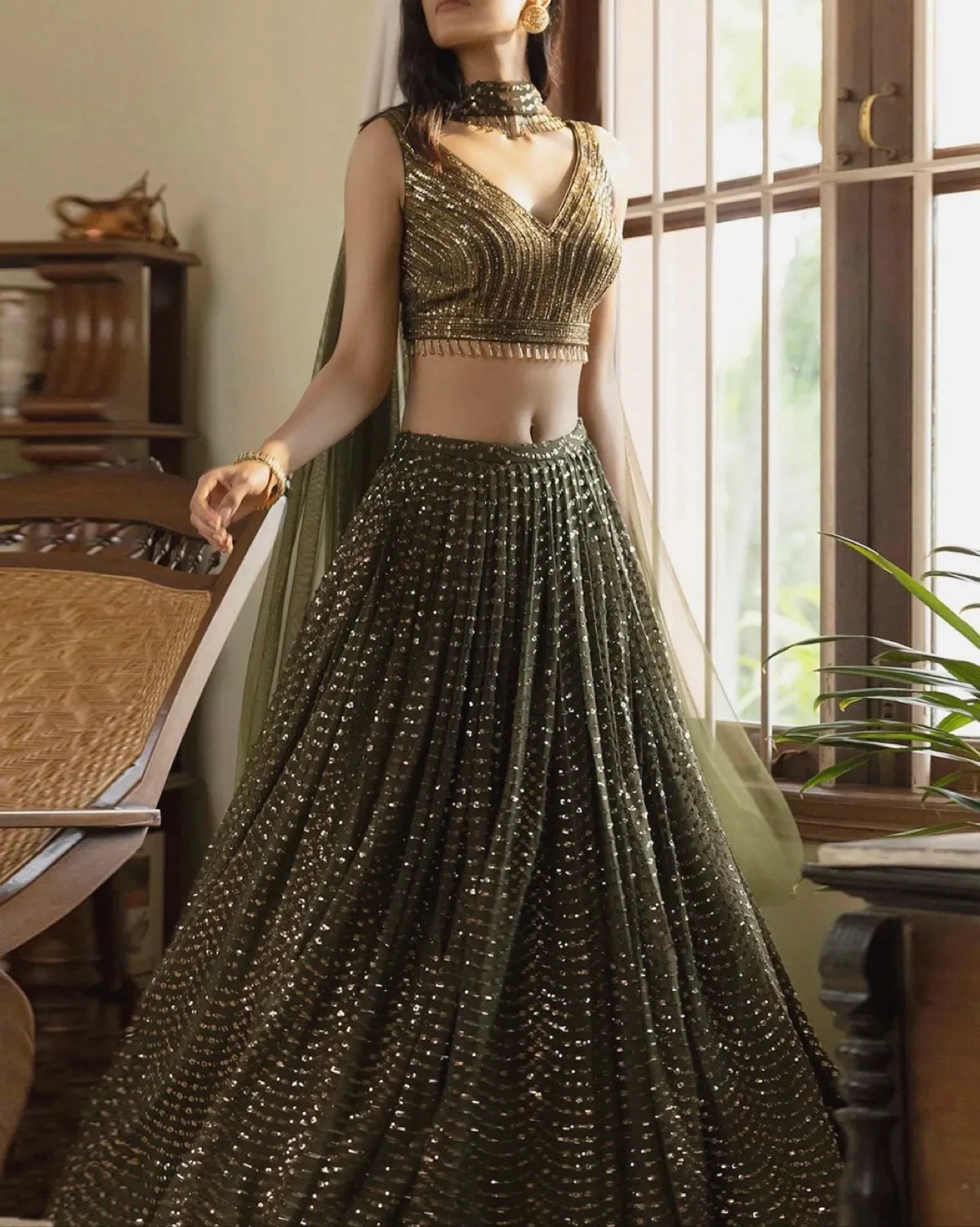 Basanti kapde Aur Koffee  Glamorous Moss Green Sequined Lehenga Set