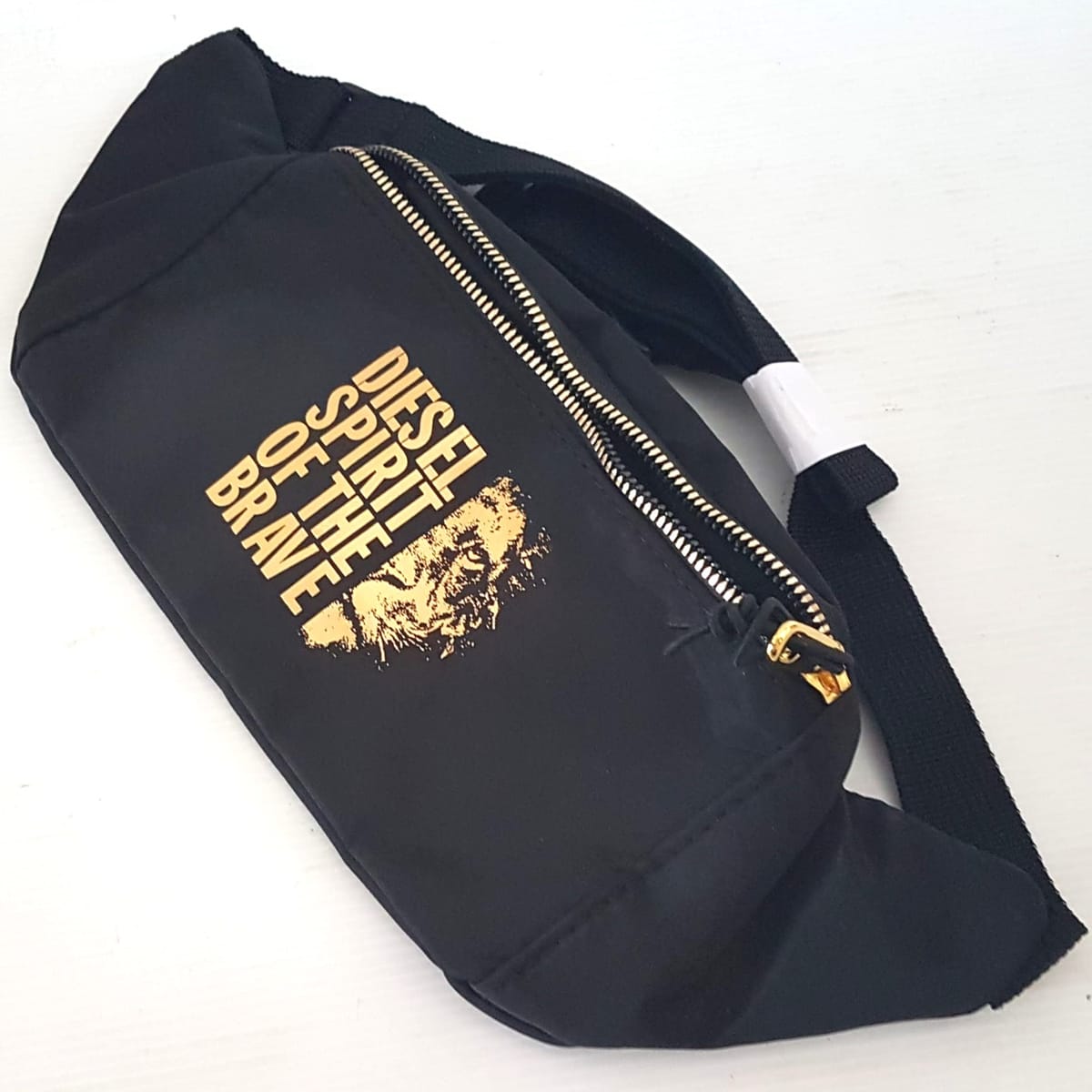 Original DIESEL Waist Pouch, ITALY, Cool Fanny Pack, Black Belt Bag, Gold Lion Logo, Sleek Model, Diesel Spirit of the Brave, Cosmopolitan Clutch, Limited Edition Satchel, Intricate Design, Sophistication, Luxury Living, Pop Culture, Cult Street Fashion