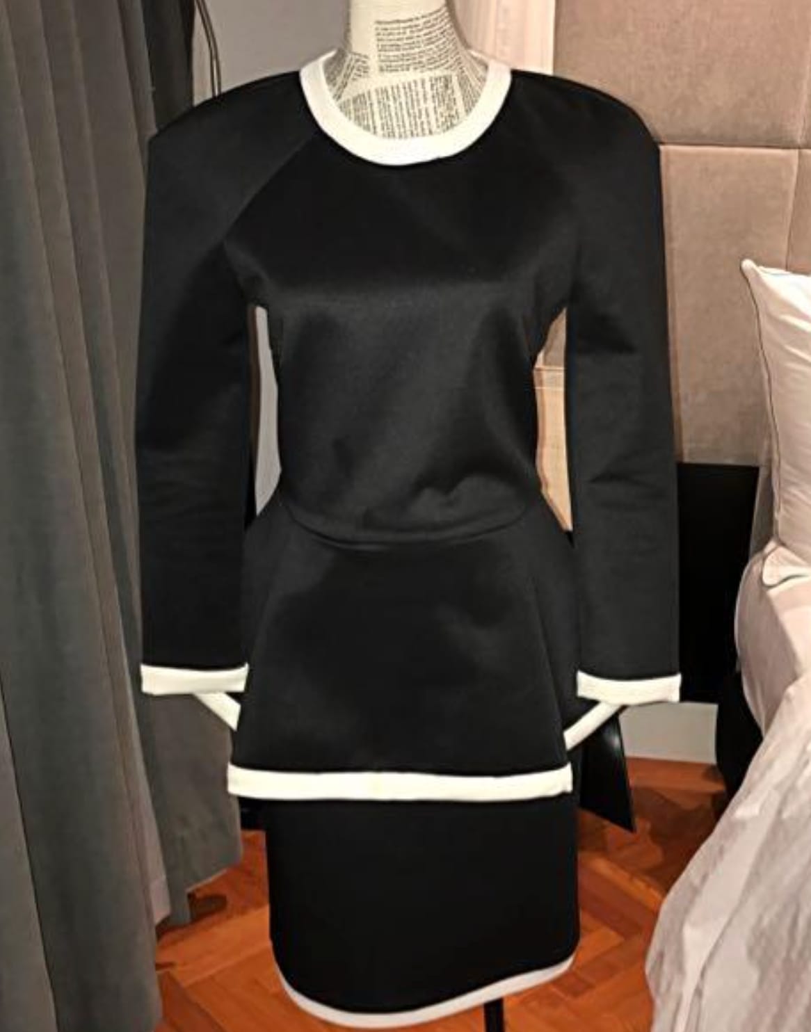 Chic Black Peplum Dress with White Trim