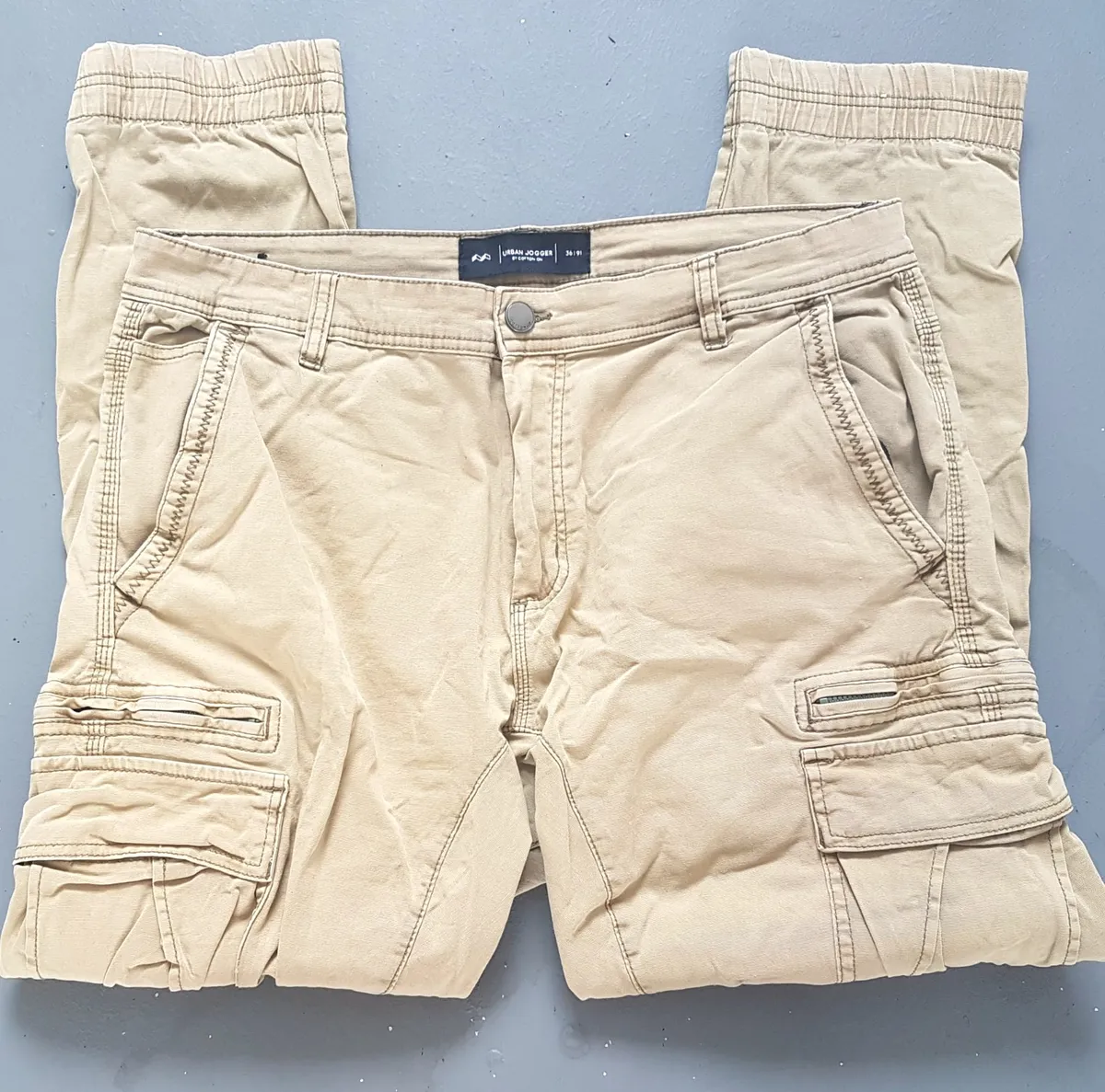 Urban Jogger URBAN JOGGER Size 36, Khaki Jogger Pants, Cool Cargo Pants, Cosmopolitan, Designer Bottoms, Stylish Trousers, Cuff Zipper Ankle, Active Lifestyle, Pop Culture, Hip Hop, Rock Star, Sophistication, Streetwise, Timeless Appeal, Everyday Fashion, Roadster
