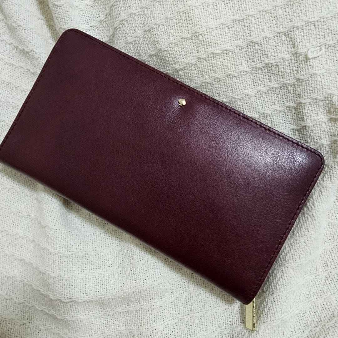 Kate Spade Madison Ave Long Wallet in Bordeaux Red