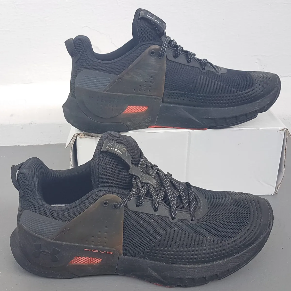 UNDER ARMOUR Original UA HOVR™ Apex Training Shoes, US 10, UK 9, EUR 44, CM 28, UA Black Sneakers, Orange Accents, Cosmopolitan, Versatile Cross Trainer, Urban Style, Soft Running Cushioning, Weightlifting Stability, Timeless Appeal, Pop Culture, Cult Street Fashion