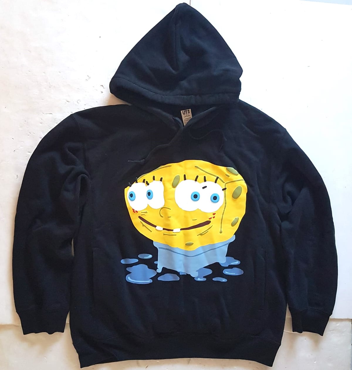 Original UNIQLO SpongeBob SquarePants Hoody Pullover, Black Sweater, Cosmopolitan, Hooded Jumper, Cool Outerwear, Sleek Designer Hoodie, Warm Jacket, Cactus Plant Flea Market Model, Sophistication, Streetwise, Timeless Appeal, Urban Style, Pop Culture
