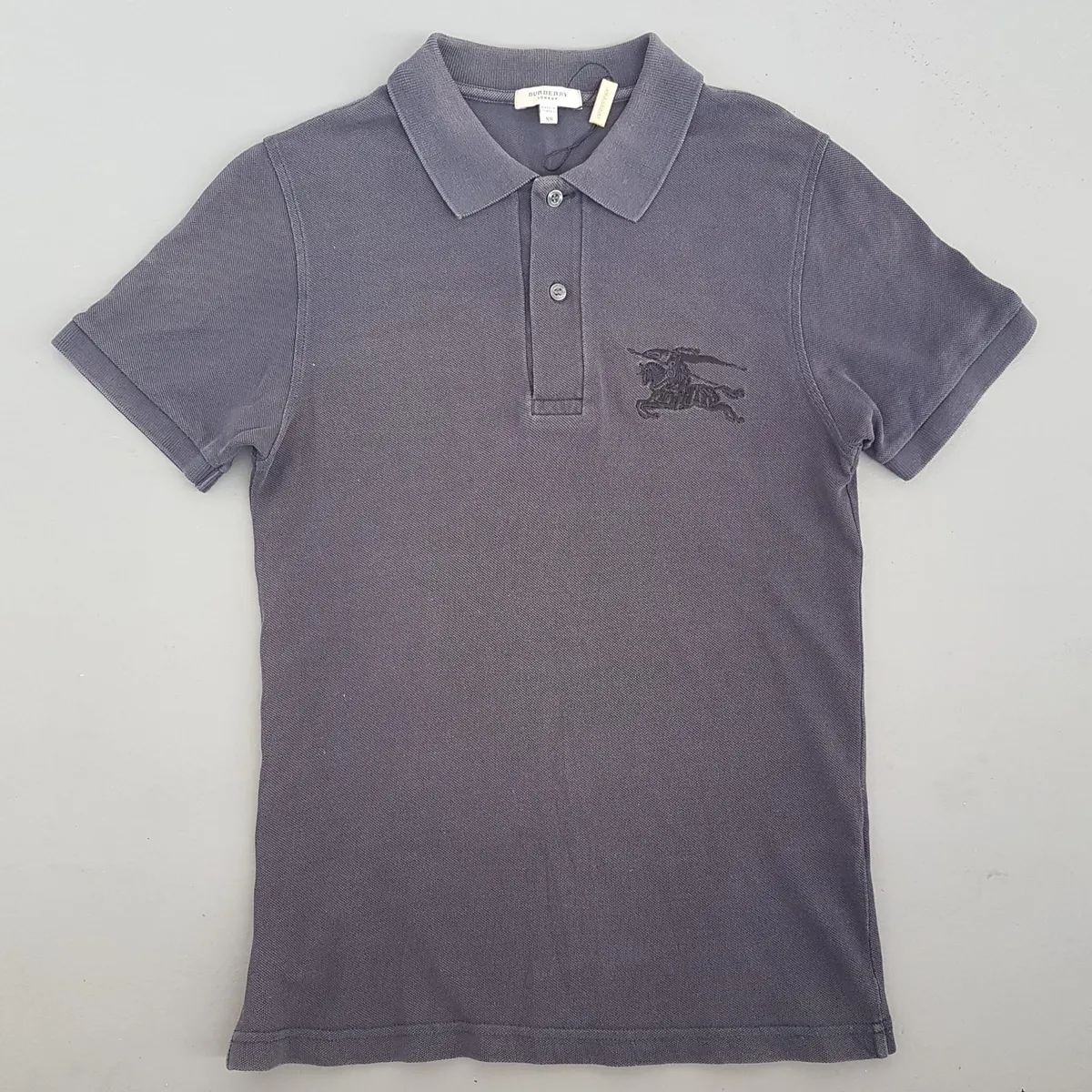 Original BURBERRY LONDON Polo Shirt, Cool Big Logo Gray Top, Iconic Embroidered Equestrian Knight Logo, 2 Buttons Polo Shirt, Burberry Tag, Luxury Lifestyle, Urban Style, Sophistication, Streetwise, Pop Culture, Summer Holidays, Timeless Appeal