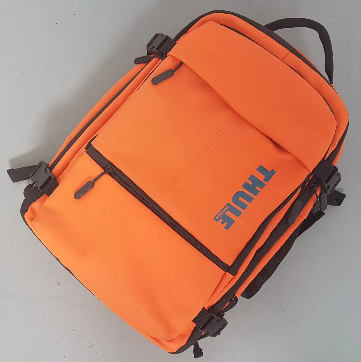 THULE from Sweden THULE Chasm Backpack, SWEDEN, Luxury 40L Haversack cum Duffel, 2 in 1 Design, Autumnal Orange Colorway, Durable Weather Resistant, Commute, Travel, Laptop Pack, Outdoor Gear, Dual Compression Buckles, Top & Side Handle, Sophistication, Cult Street Fashion