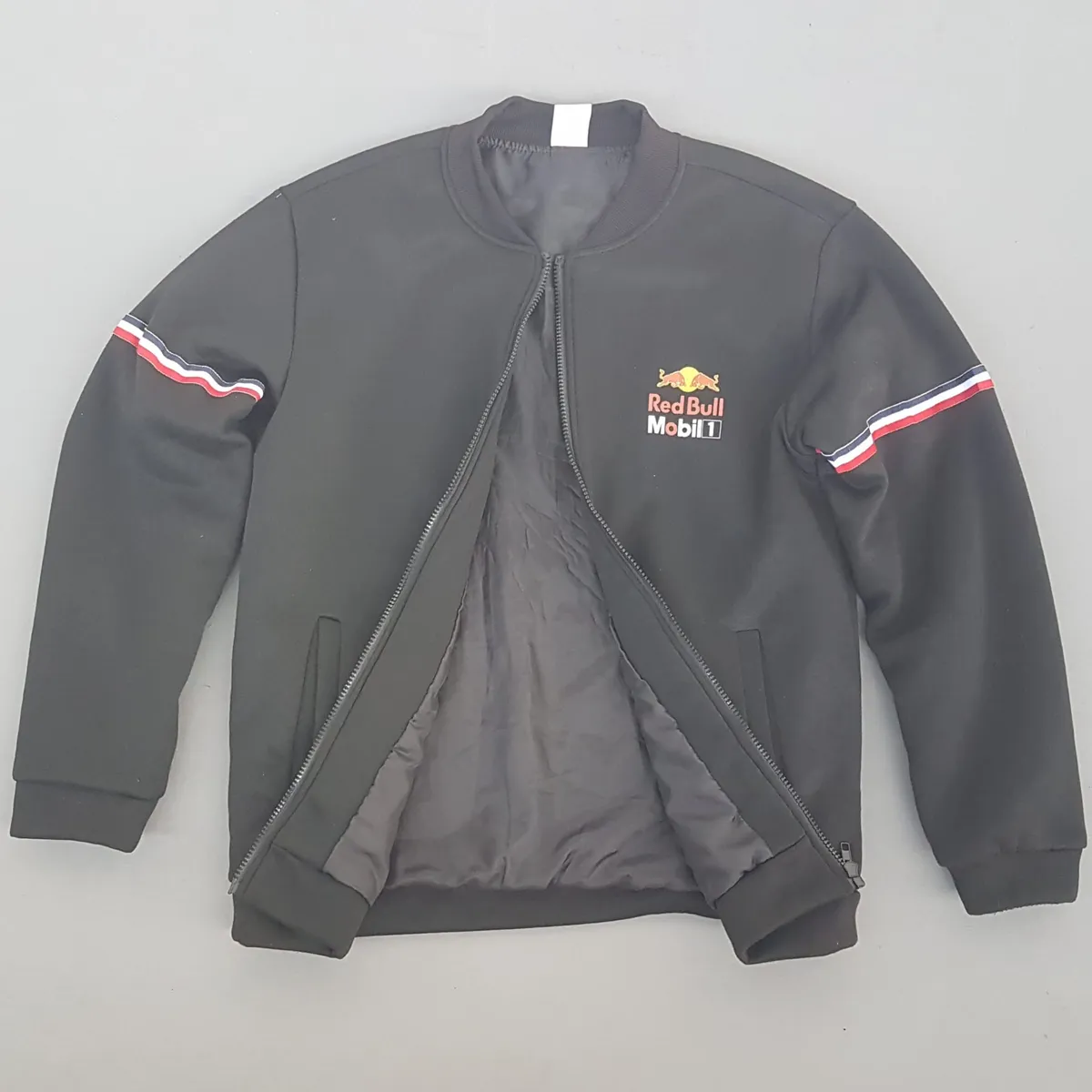 RED BULL Red Bull Racing Team Jacket, Red Bull Mobil 1 Logo, Cosmopolitan, Cool Black Top, F1 Tracksuit, Outerwear, Zipper Bomber Jacket, Cool Coat, Urban Style, Timeless Appeal, Sophistication, Streetwise, Pop Culture, Hip Hop, Celebrities, Cult Street Fashion