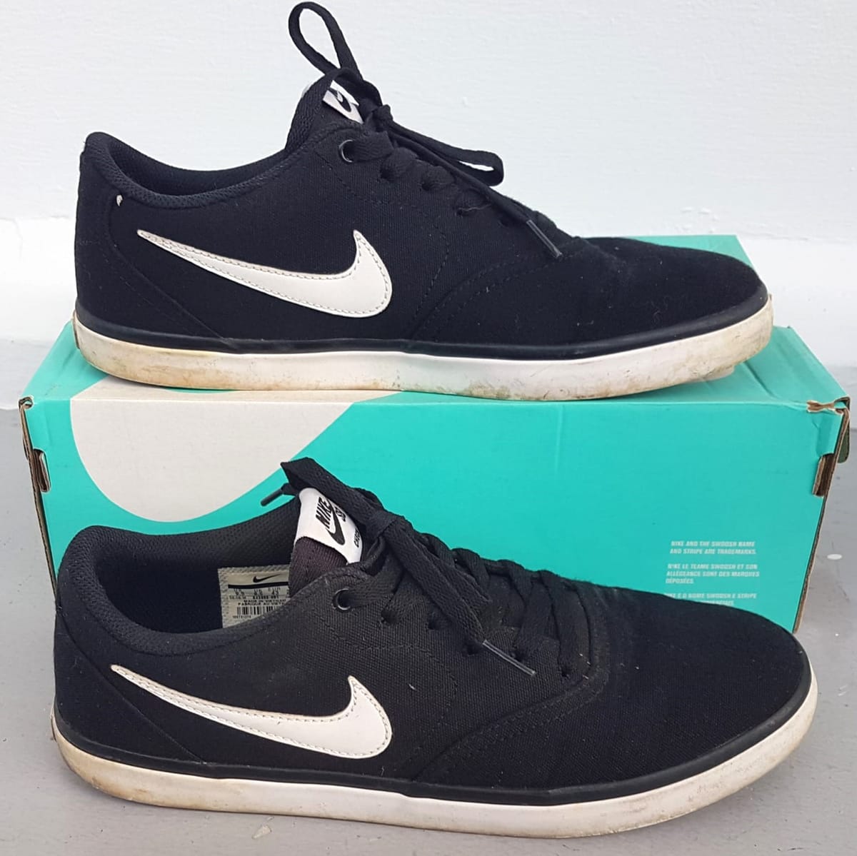 Original NIKE DUNK SB Check Sneakers, US 9.5, UK 8.5, EU 43, CM 27.5, Continental, Solar Soft Black Shoes, White NIKE Logo, Cosmopolitan, Sleek Design, Urban Style, Streetwise, Sophistication, Cult Street Fashion, Roadster, Stunt, Skate, Surf