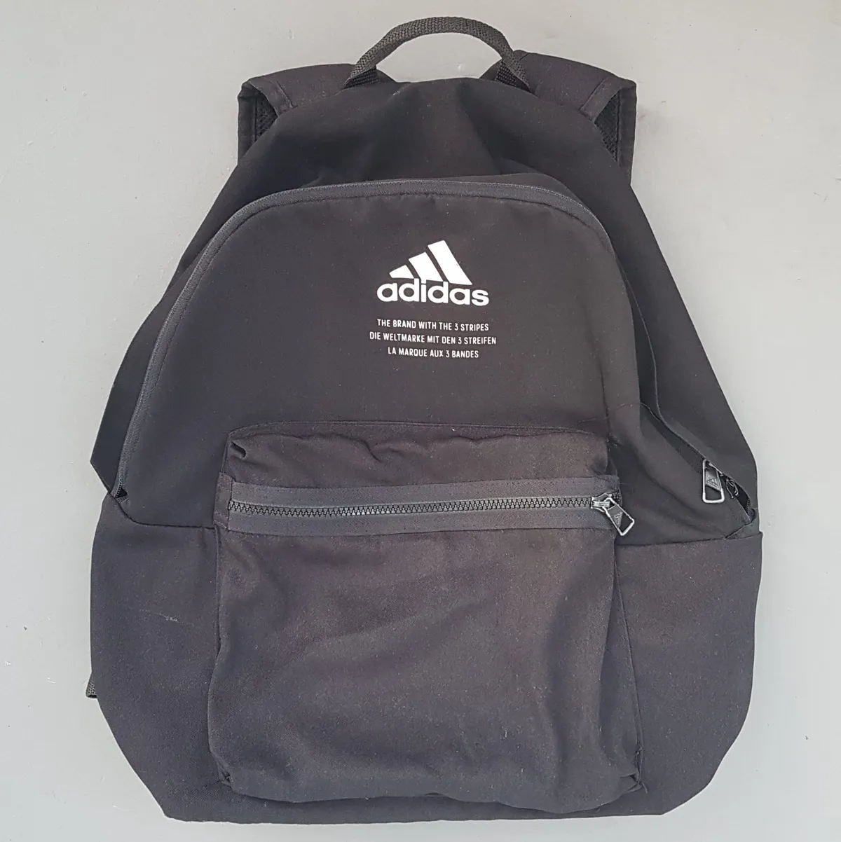 Classic ADIDAS Backpack, Cool Black Haversack, Iconic 3 Stripes Logo, Original Adidas Rucksack, Cosmopolitan, Cool Carrier, Urban Style, Travel Pack, Backpacker, Sophistication, Streetwise, Outdoor Gear, Cult Street Fashion, Timeless Appeal