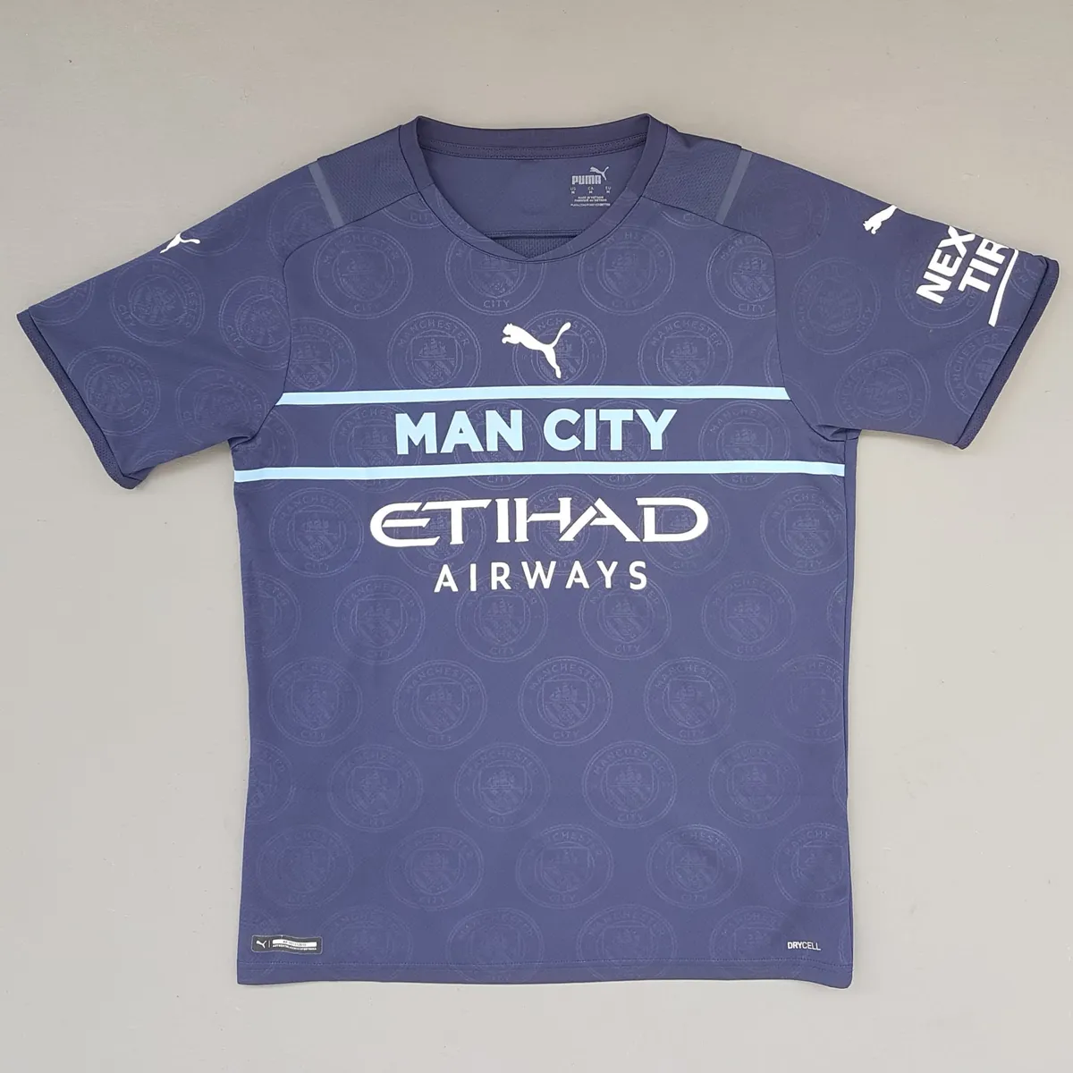 Puma Retro Manchester City Jersey, Original PUMA Top, Blue Shirt, Etihad Airways, NEXEN Tire, Cosmopolitan, Authentic Licensed Football Merchandise, Sophistication, Erling Haaland, Pep Guardiola, Pop Culture, Urban Style, Timeless Appeal, Cult Street Fashion