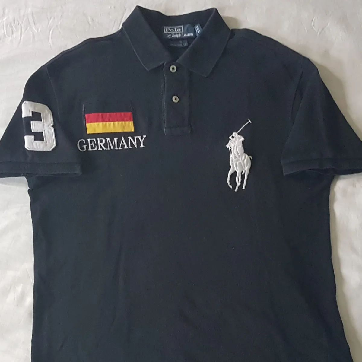 Luxury Polo Shirt by Ralph Lauren, Retro GERMANY Flag Number 3 Model, MEDIUM 2 Buttons Top, Black Shirt, Big White RL Polo Logo, Custom Fit, All American, Summer Holidays, Urban Style, Sophistication, Pop Culture, Rock Star, Everyday Fashion